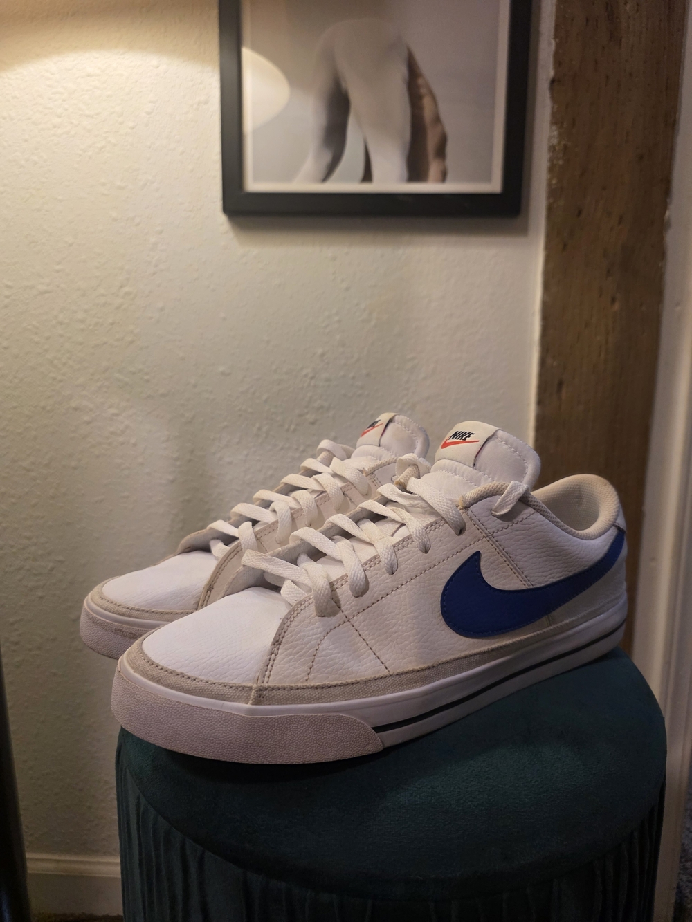 Nike Men’s White Low-Top Sneakers with Blue Swoosh